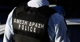 Greek policeman with a bulletproof vest
